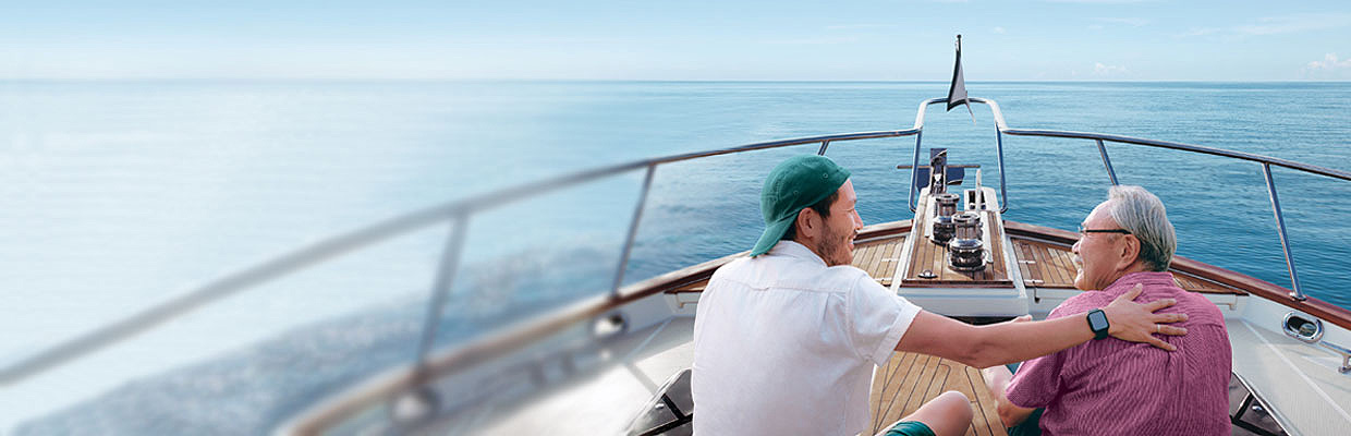 Father and son at sea; image used for HSBC SG Insurance Emerald Legacy Life II.